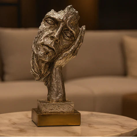 Contemplative Figure Sculpture